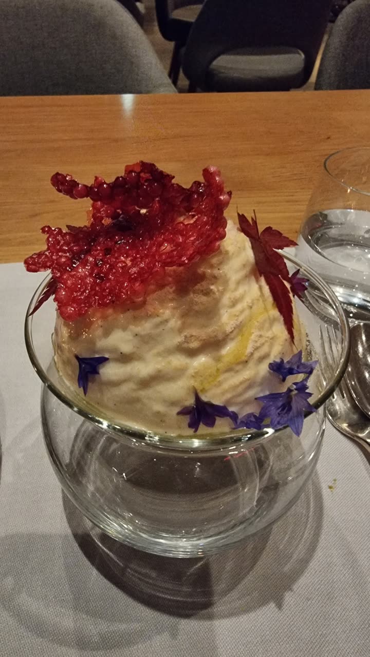 Original photo: dessert in a glass on a restaurant table, shot on a phone